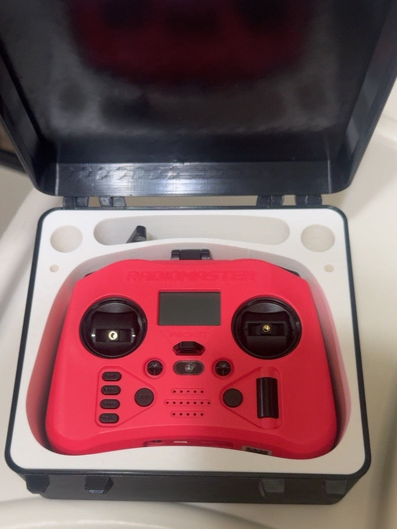Open custom carrying case with red RadioMaster Pocket controller shown inside for fit demonstration