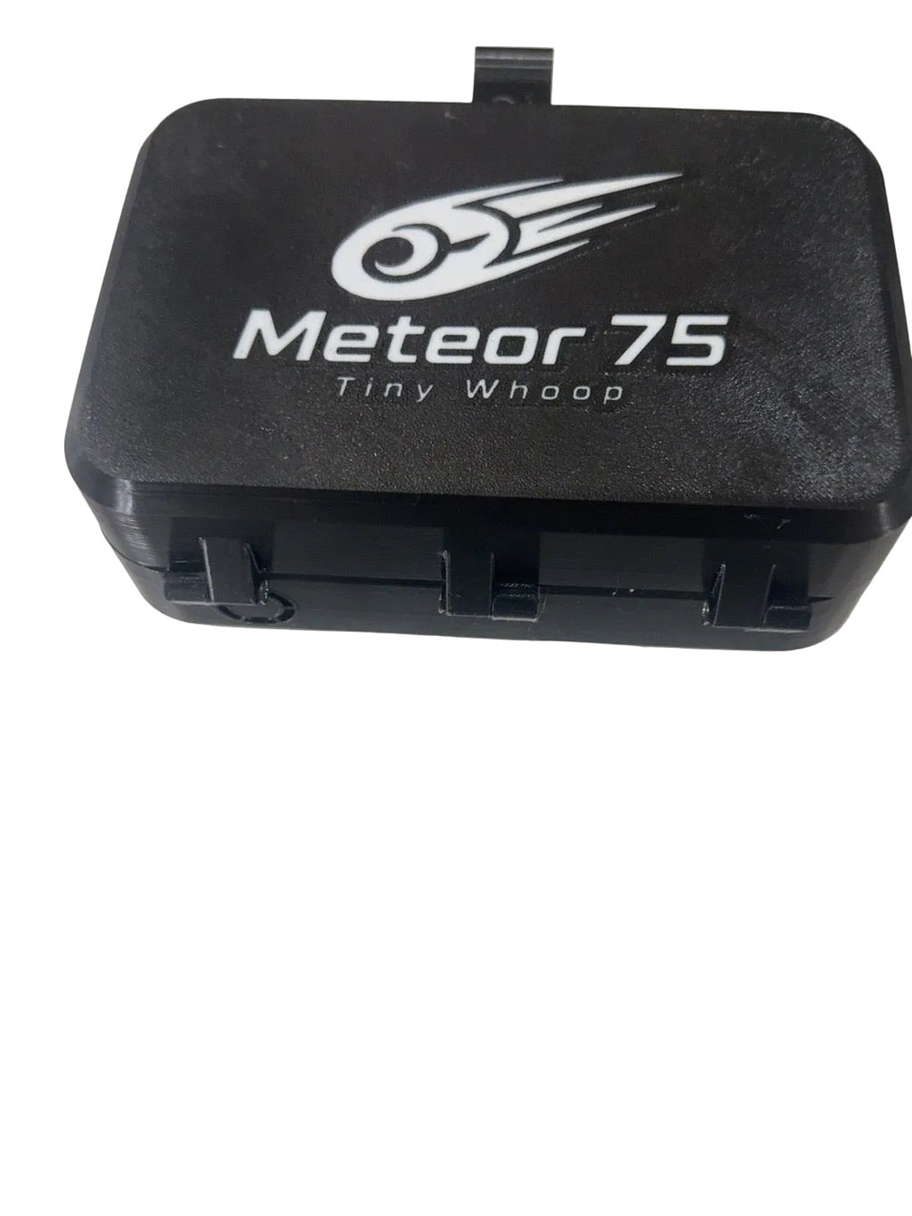 Closed black 3D printed Meteor75 Tiny Whoop carrying case with white graphic