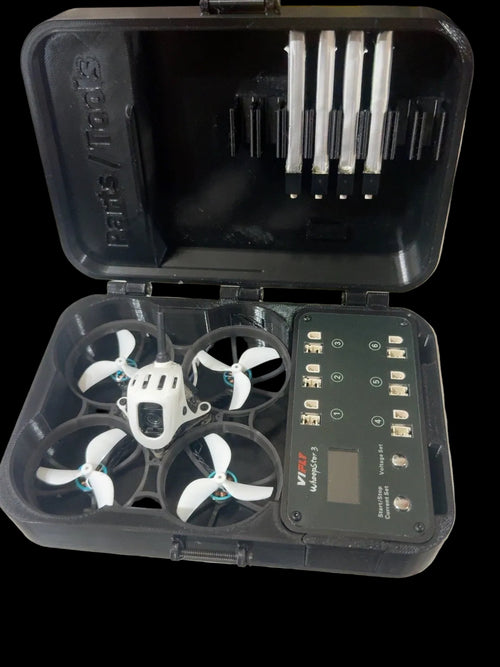 Open 3D printed Meteor75 carrying case with drone and WhoopStor 3 charger in fitted compartments